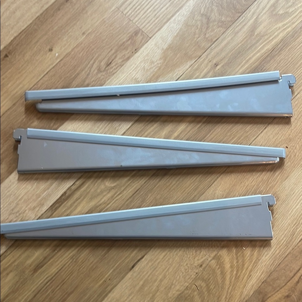 3 Elfa Gray Shelf Brackets with covers